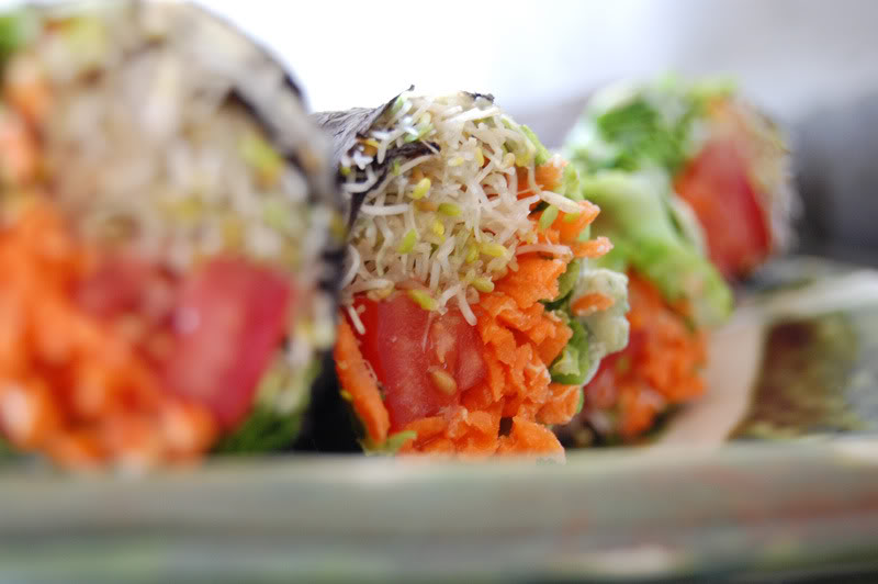 The Global Girl Raw Food Recipes: No-Rice Raw Vegan Sushi with clover sprouts, tomatoes, lettuce and carrot with a basil and jalapeño cashew dip.