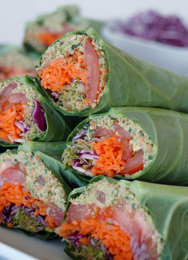 The Global Girl Raw Food Recipes: Raw Falafel Wrap in a Collard Green Leaf with carrot, sprouts, tomato, red cabbage  and red onion.
