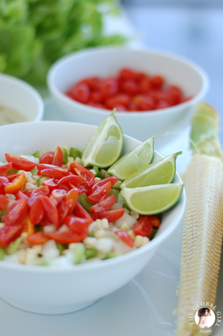 Crunchy corn salad with creamy dairy free dressing on a bed of curly leaf lettuce. Totally raw, vegan, gluten free and oil free.