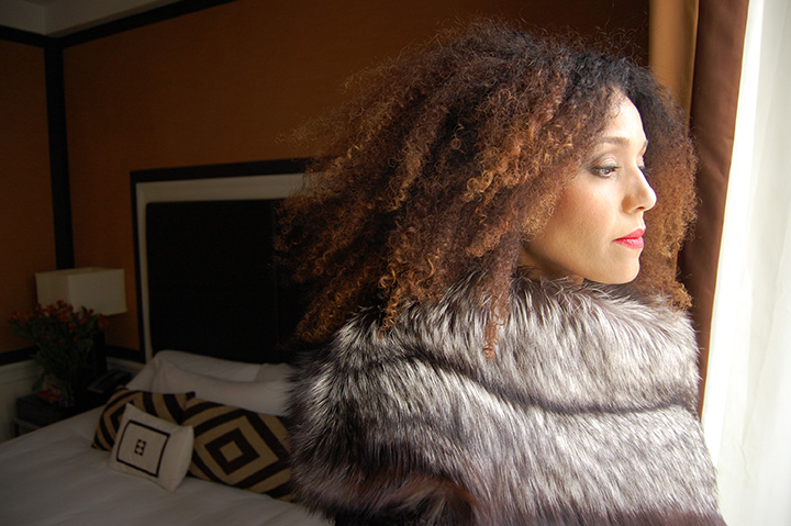 The Global Girl Daily Style: Ndoema photographed in a fur trimmed coat by Mimi Plange at the Empire Hotel during New York Fashion Week Fall 2014.