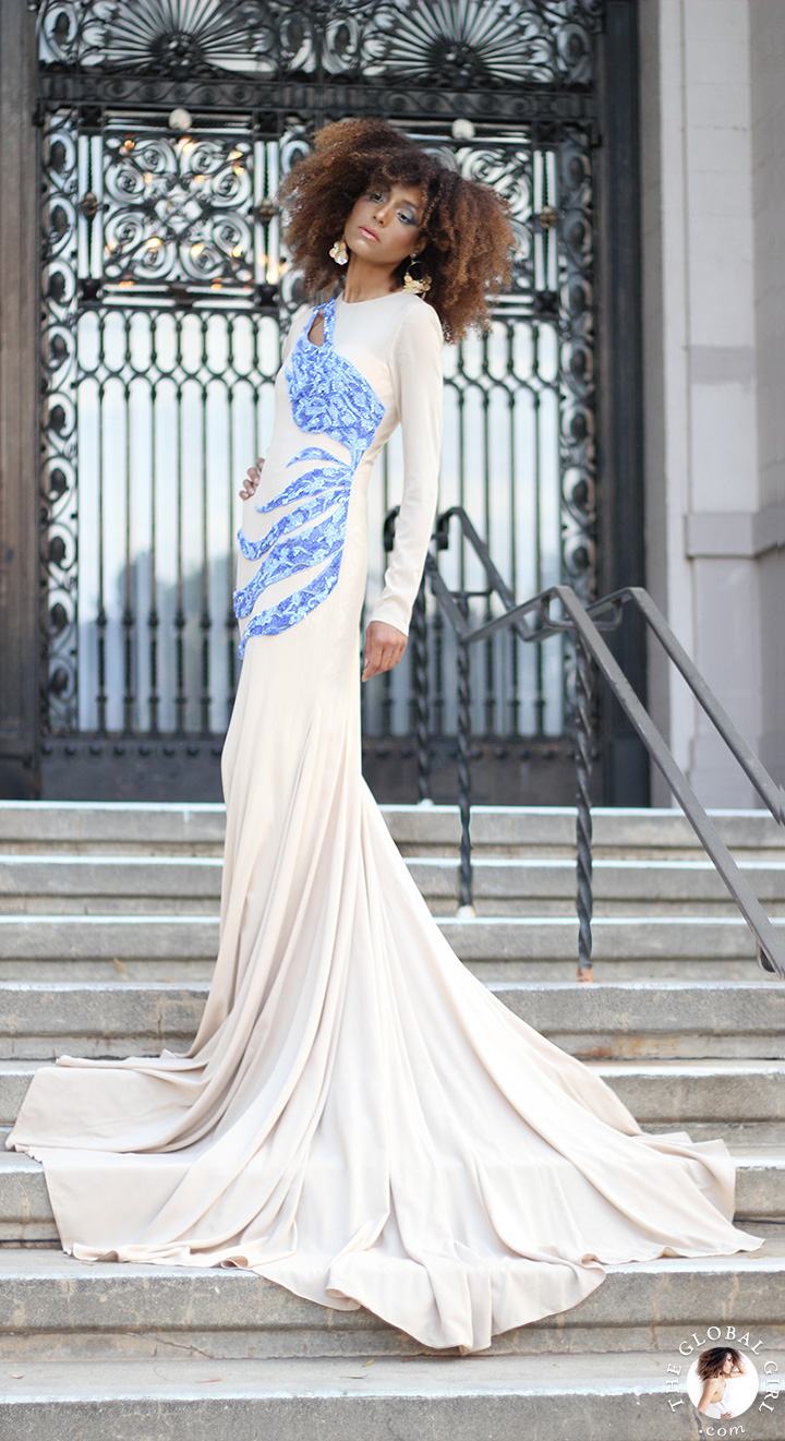 Ndoema arrives at the Wilshire Ebell Theatre in a hand-beaded mermaid evening gown with vintage mother of pearl chandelier earrings.