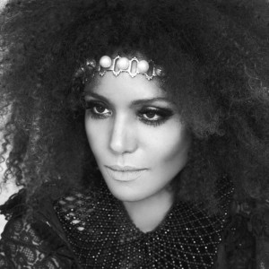 Ndoema rocks a seventies inspired look with her trademark big natural hair.