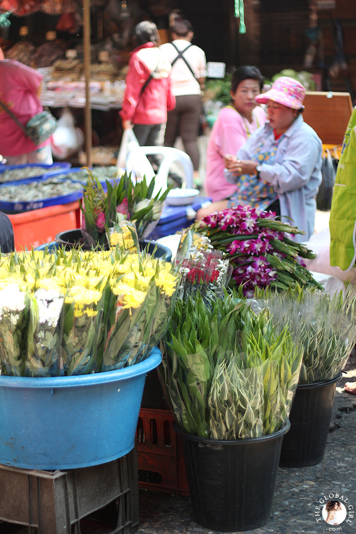 The Global Girl Travels: Flower stand at Khlong Toey market in Bangkok, Thailand.