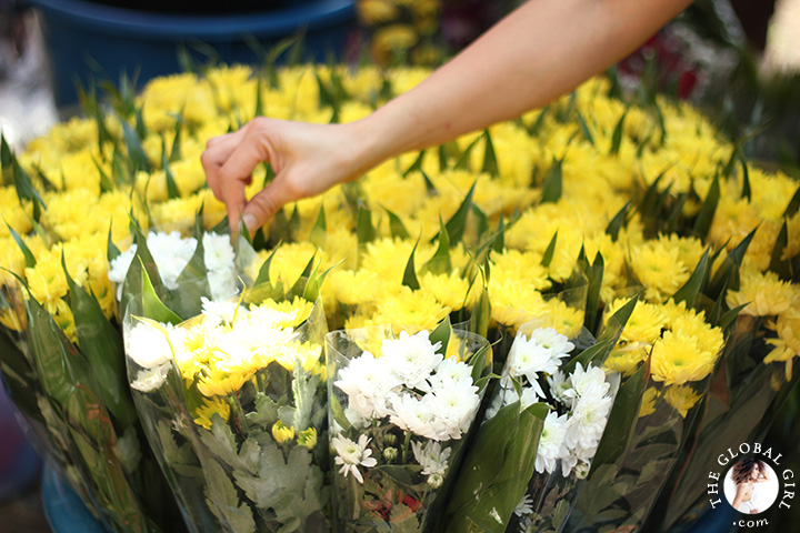 The Global Girl Travels: Colorful flowers at Khlong Toey market in Bangkok, Thailand.