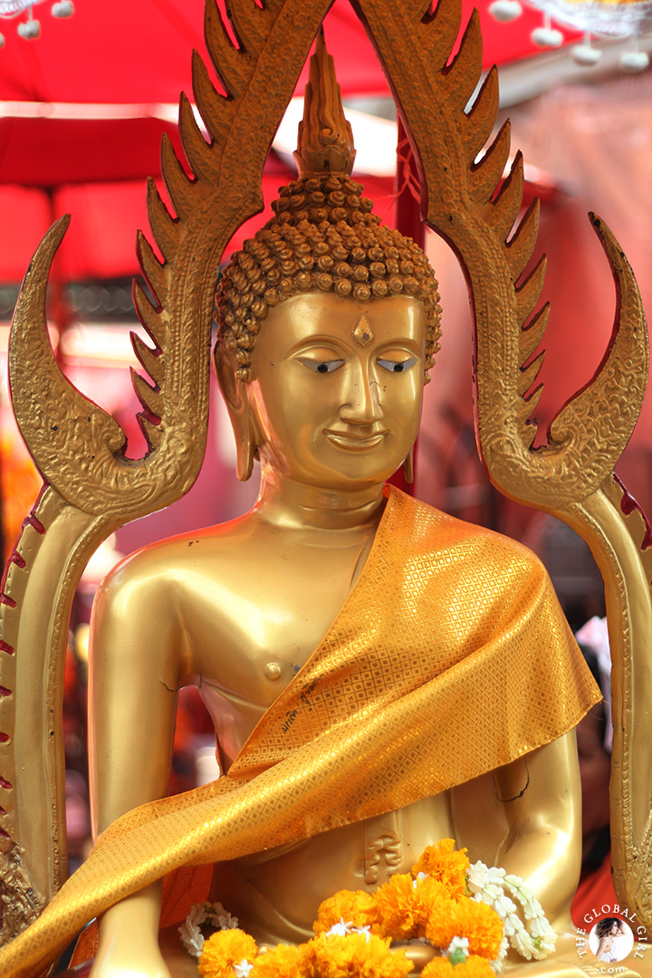 The Global Girl Travels: Beautiful gold buddha at Khlong Toey market in Bangkok, Thailand.