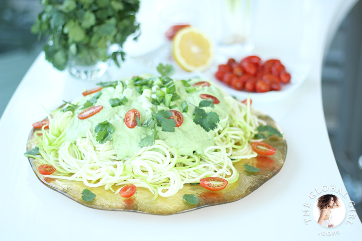 The Global Girl Raw Food Recipes: Step inside The Global Girl kitchen for huge meal of raw vegan zucchini pasta with creamy cashew and cilantro sauce. This quick, easy, gluten-free, dairy-free and super delicious zucchini pasta recipe is perfect to satisfy those carbs and pasta cravings. A feast for all pasta lovers!