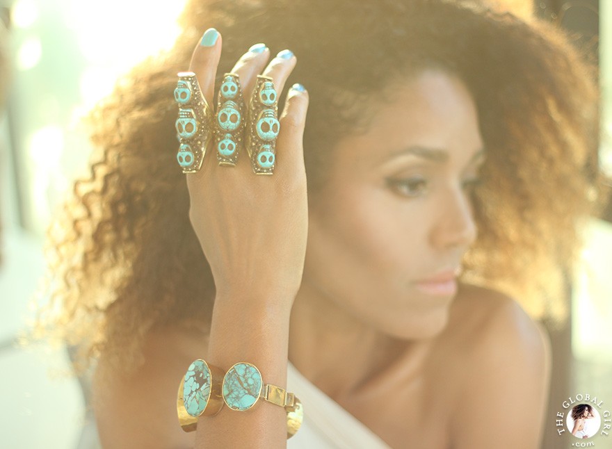 The Global Girl Fashion: Ndoema sports multiple turquoise and brass skull rings with a matching oversized bracelet.