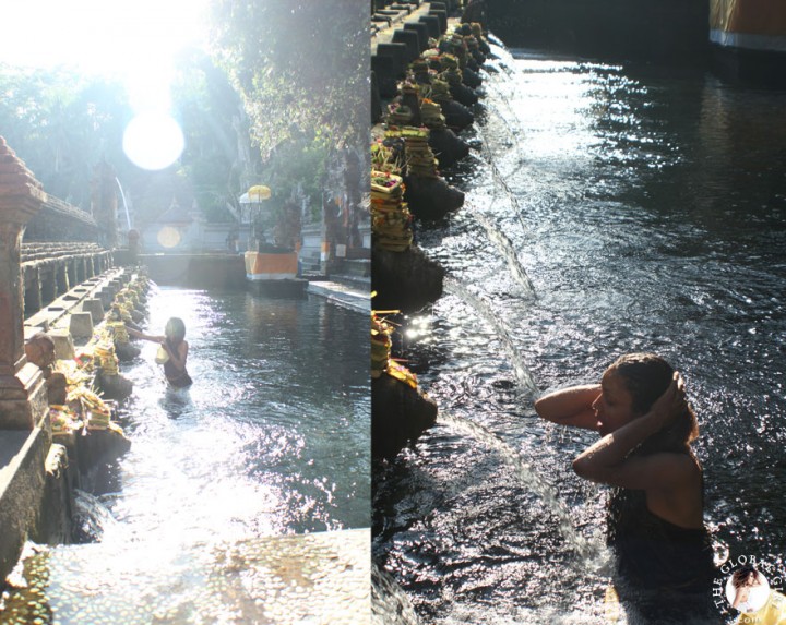 The Global Girl Travels: Ndoema bathing in holy spring water at the Tirta Empul Holy Temple in Bali, Indonesia.