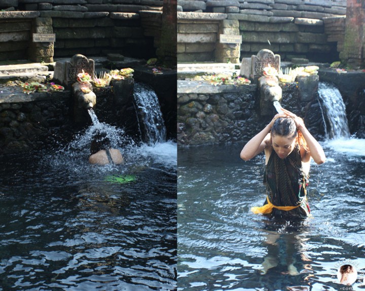 The Global Girl Travels: Ndoema bathing in holy spring water at the Tirta Empul Temple in Bali, Indonesia.