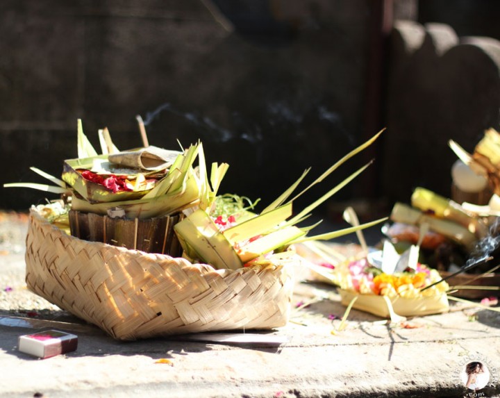 The Global Girl Travels: Balinese flower offerings (canang sari) at the Tirta Empul Temple in Bali, Indonesia.