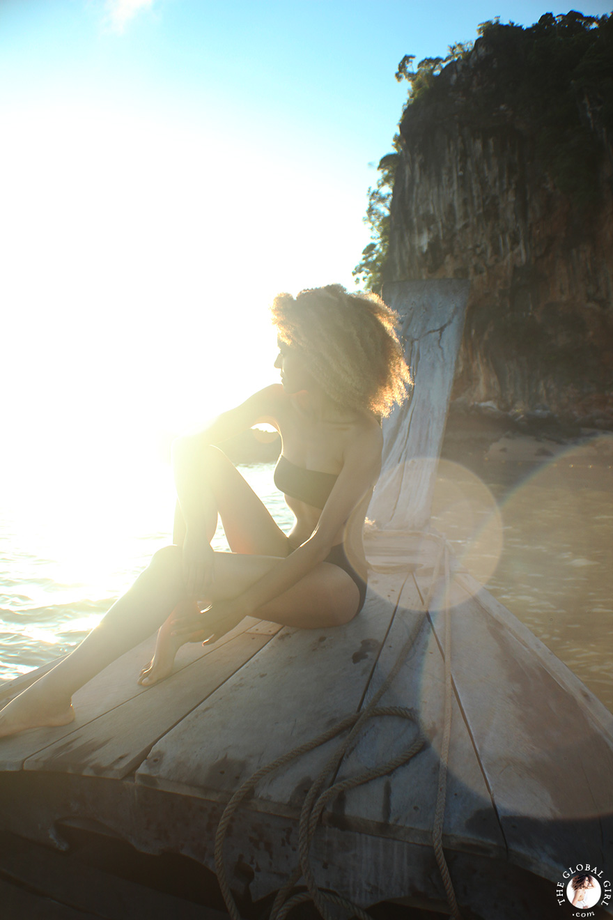 The Global Girl Travels: Ndoema sports a cut out swimsuit while sailing in the Phang Nga Bay in Thailand.