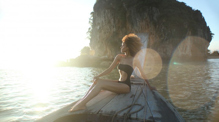 The Global Girl Travels: Ndoema sports a cut out swimsuit while sailing in the Phang Nga Bay in Thailand.