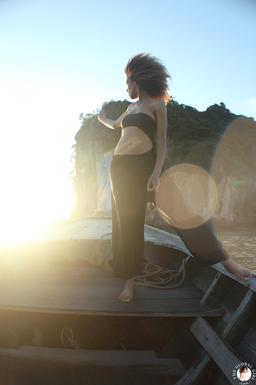 The Global Girl Travels: Ndoema sports a cut out swimsuit while sailing in the Phang Nga Bay in Thailand.