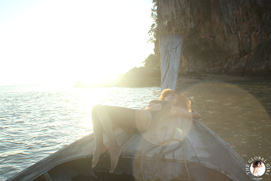 The Global Girl Travels: Ndoema sports a cut out swimsuit while sailing in the Phang Nga Bay in Thailand.