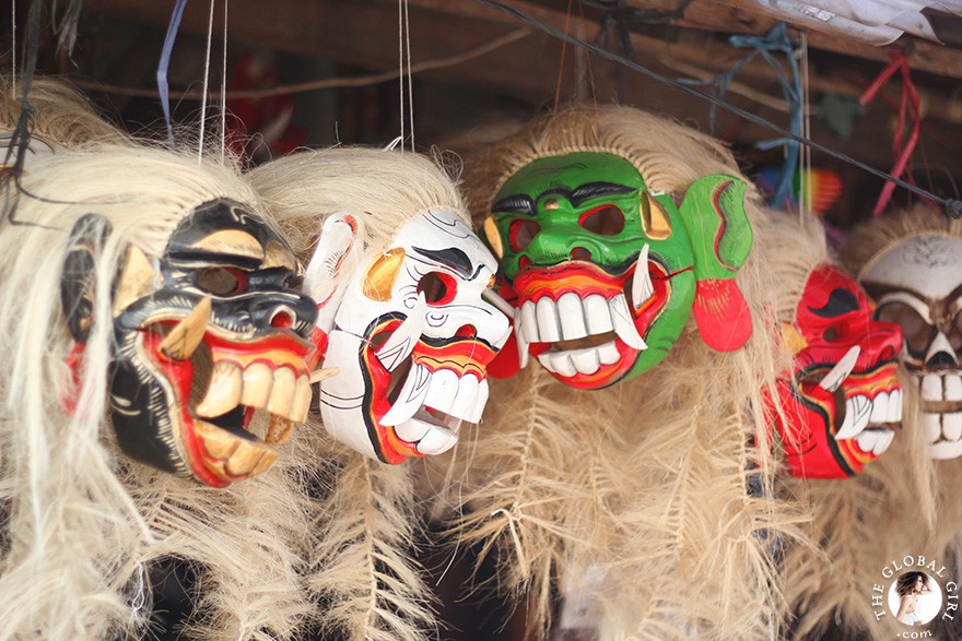 The Global Girl Travels: Balinese demon masks at Candi Kuning market in Bali, Indonesia.