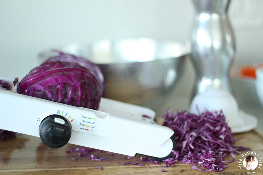 The Global Girl Raw Food Recipes: Achieve these super thin shredded red cabbage using a mandoline slicer.