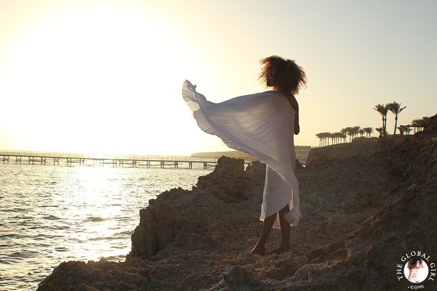 The Global Girl Editorials: Ndoema channels her inner goddess in a one-shoulder pleated dress at The Red Sea Riviera in Marsa Alam, Egypt.