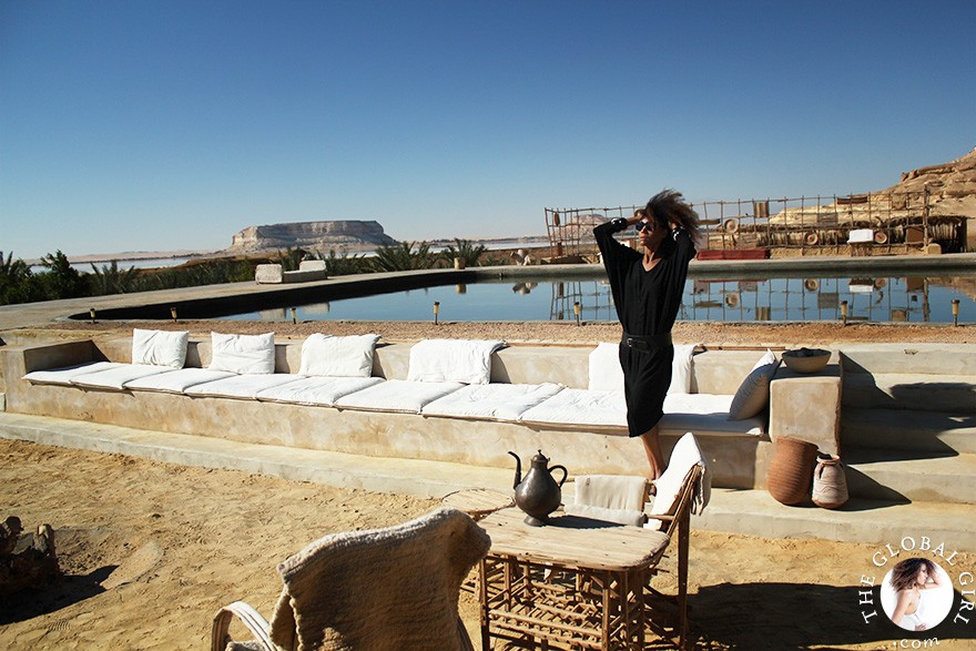 The Global Girl Travels: Relaxed and chic in a Moroccan-inspired batwing dress and tribal bracelets, Ndoema explores desert eco-chic living at luxury eco-lodge Talist at Siwa Oasis in the Libyan desert.