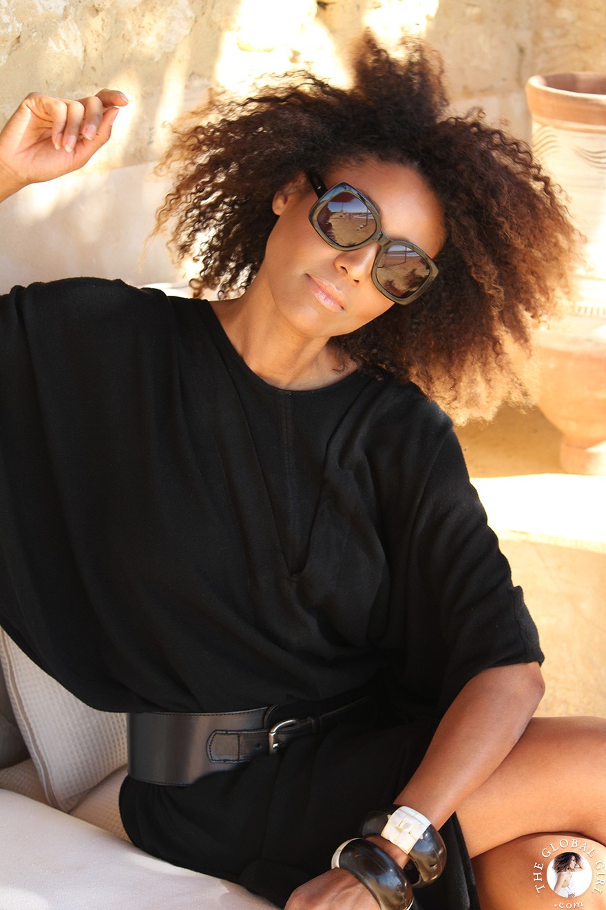 The Global Girl Travels: Relaxed and chic in a Moroccan-inspired batwing dress and tribal bracelets, Ndoema explores desert eco-chic living at luxury eco-lodge Talist at Siwa Oasis in the Libyan desert.