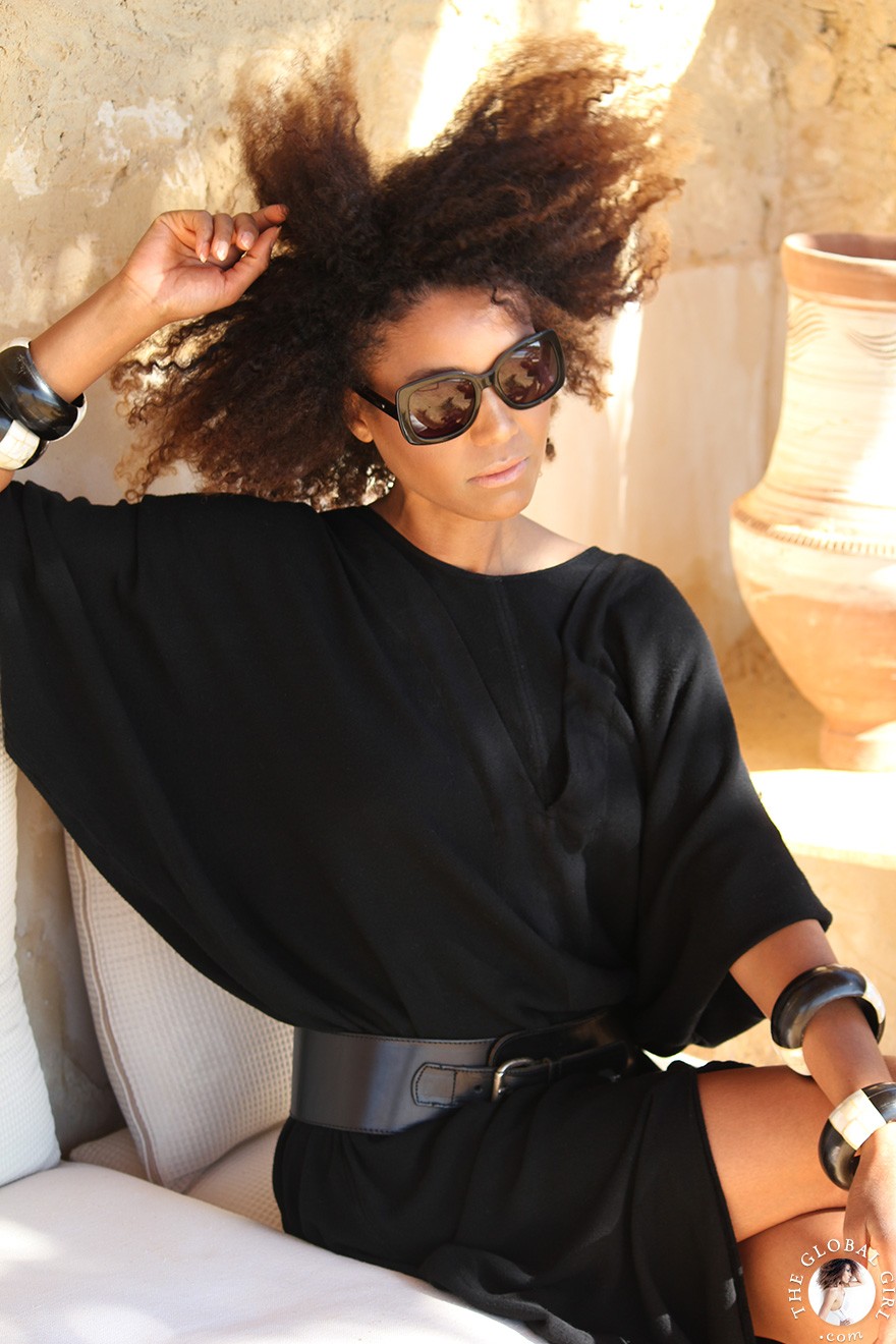 The Global Girl Travels: Relaxed and chic in a Moroccan-inspired batwing dress and tribal bracelets, Ndoema explores desert eco-chic living at luxury eco-lodge Talist at Siwa Oasis in the Libyan desert.