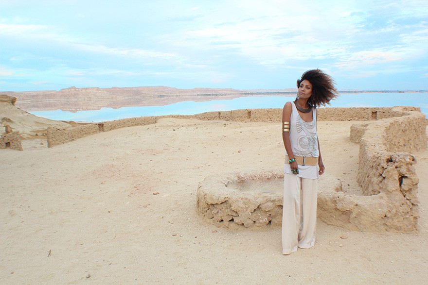 The Global Girl Daily Style: Ndoema in boho chic inspired beaded tank, palazzo pants, jeweled sandals and tribal jewelry. Photographed at the Adrère Amellal luxury eco-friendly desert resort at Siwa Oasis, Egypt.