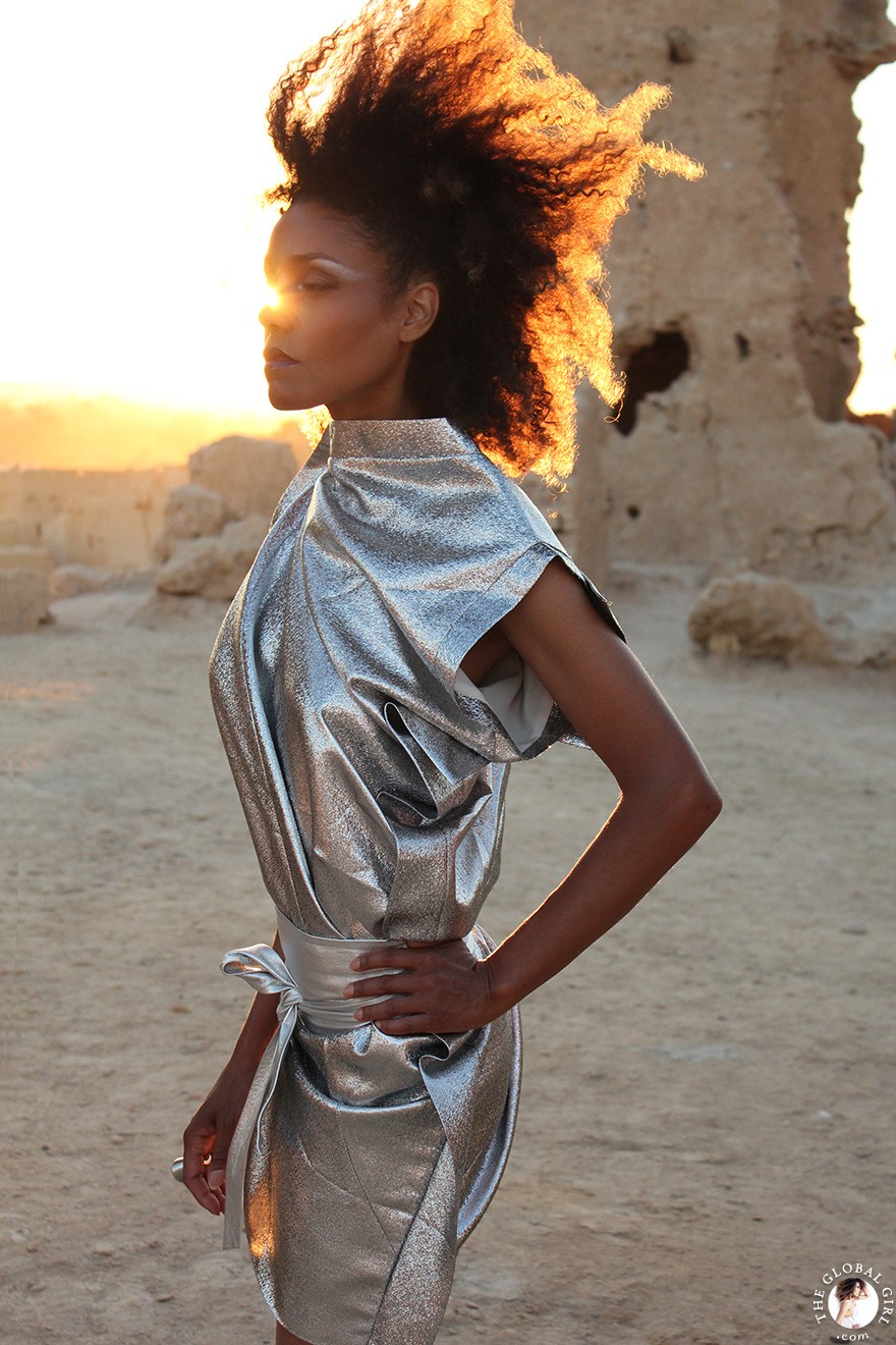 The Global Girl Fashion Editorials: Ndoema goes futuristic in a silver metallic dress by Australian designer Ellery against the ancient ruins of Shali Ghadi, a spectacular 13th-century fortress at Siwa Oasis, Egypt.