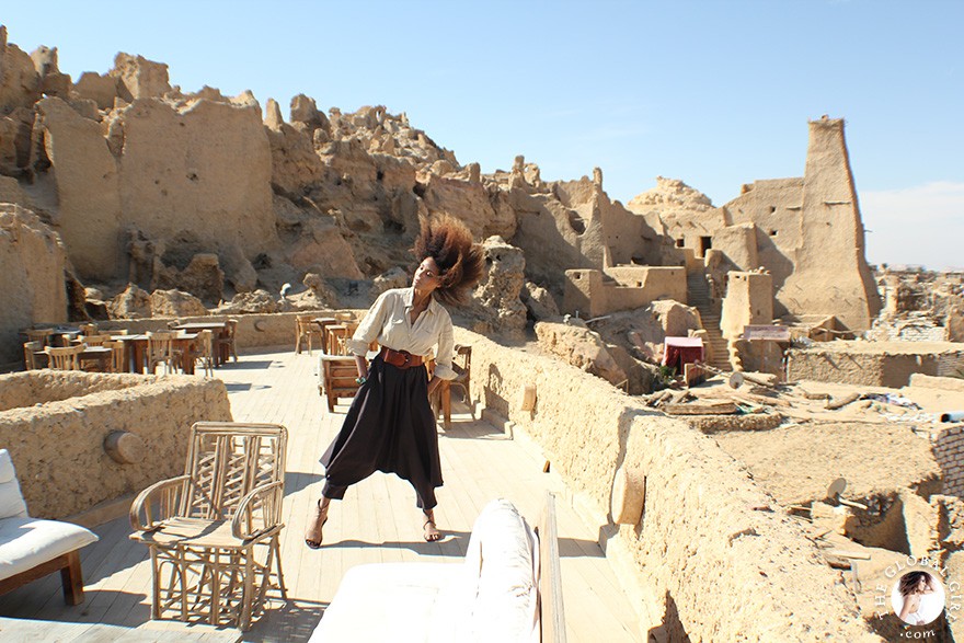 The Global Girl Travels: Ndoema goes monochromatic in earth toned tribal harem pants, safari shirt and ankle tie sandals at the Al-Babinshal Heritage hotel in Siwa, Egypt.