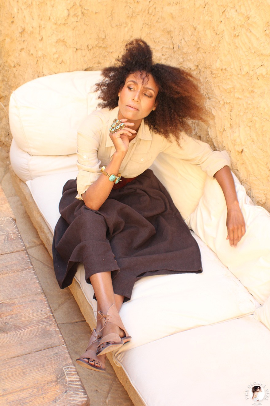 The Global Girl Travels: Ndoema goes monochromatic in earth toned tribal harem pants, safari shirt and ankle tie sandals at the Al-Babinshal Heritage hotel in Siwa, Egypt.