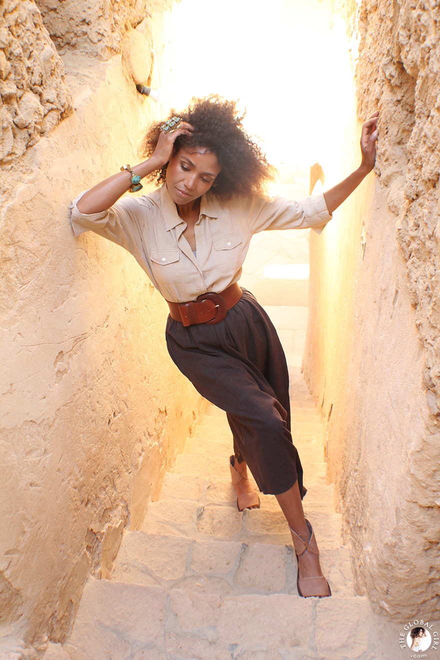 The Global Girl Travels: Ndoema goes monochromatic in earth toned tribal harem pants, safari shirt and ankle tie sandals at the Al-Babinshal Heritage hotel in Siwa, Egypt.