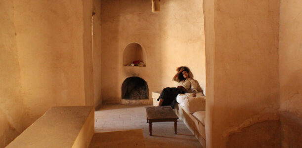 The Global Girl Travels: Ndoema goes monochromatic in earth toned tribal harem pants, safari shirt and ankle tie sandals at the Al-Babinshal Heritage hotel in Siwa, Egypt.