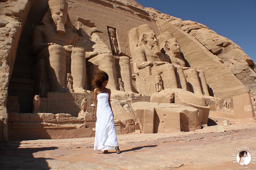 The Global Girl Travels: Ndoema arrives at the Abu Simbel temples in a white strapless maxi dress by Alexis. Photographed in Nubia, southern Egypt, near the border with Sudan.