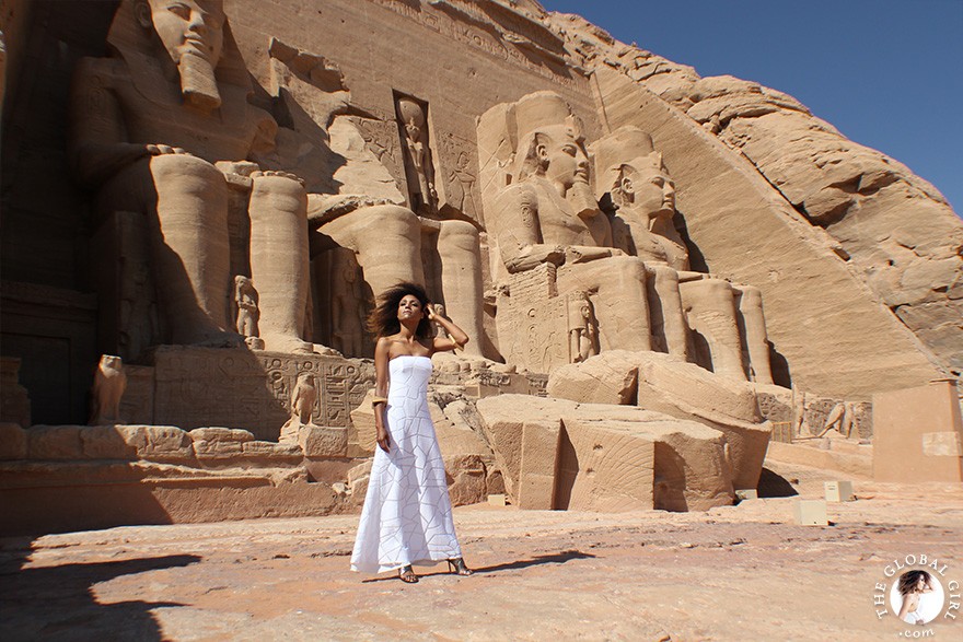 The Global Girl Travels: Ndoema arrives at the Abu Simbel temples in a white strapless maxi dress by Alexis. Photographed in Nubia, southern Egypt, near the border with Sudan.