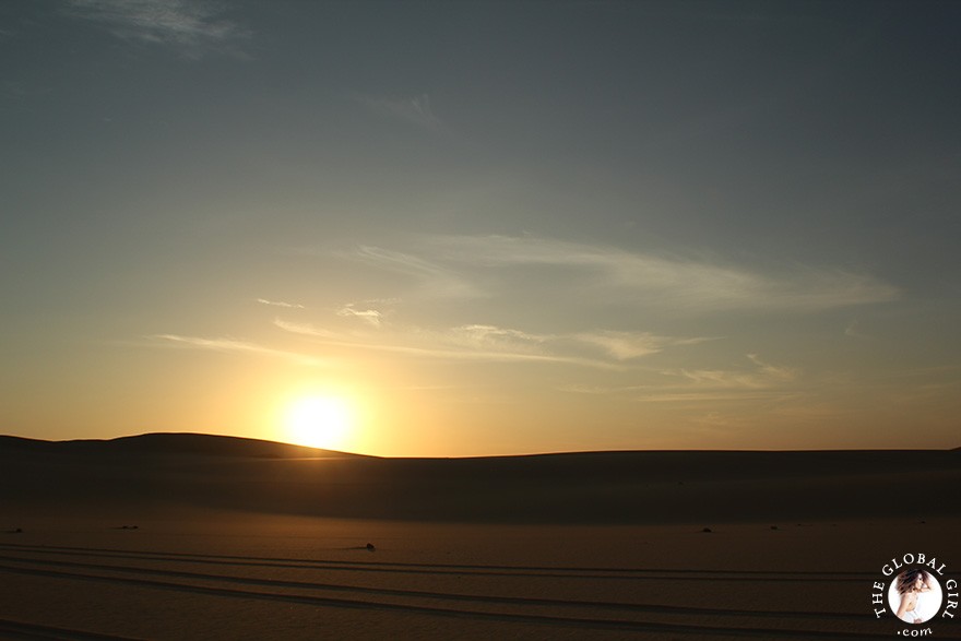 The Global Girl Travels: Sunset over the sand dunes in the Great Sand Sea, a 72,000 km² sand desert region in North Africa stretching between western Egypt and eastern Libya.