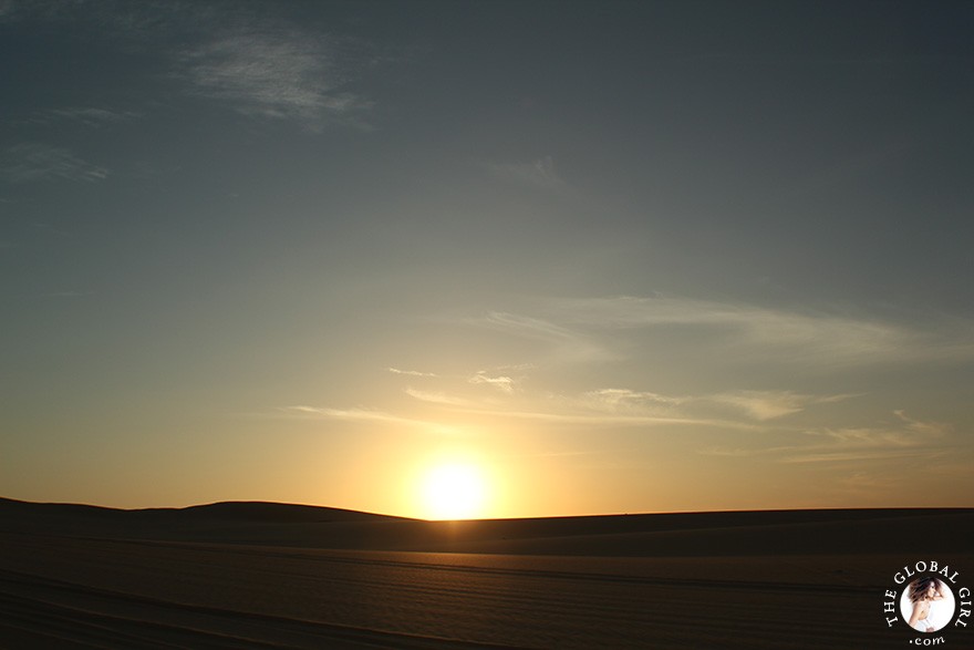 The Global Girl Travels: Sunset over the sand dunes in the Great Sand Sea, a 72,000 km² sand desert region in North Africa stretching between western Egypt and eastern Libya.