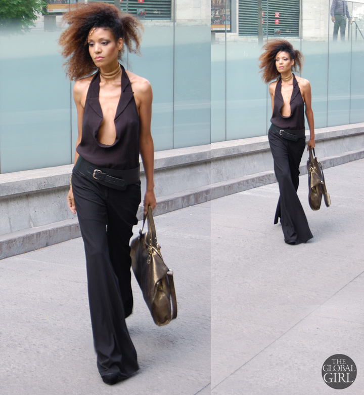 The Global Girl Fashion Week Looks: Ndoema rocks a Black & Gold look in Alexander Wang tuxedo halter top with plunging neckline, Onna Ehrlich Oversized gold metallic handbag and Maison Antonym gold vermeil choker, cuff and rings set. Vintage biker leather belt and Dolce Gabbana slit pants.