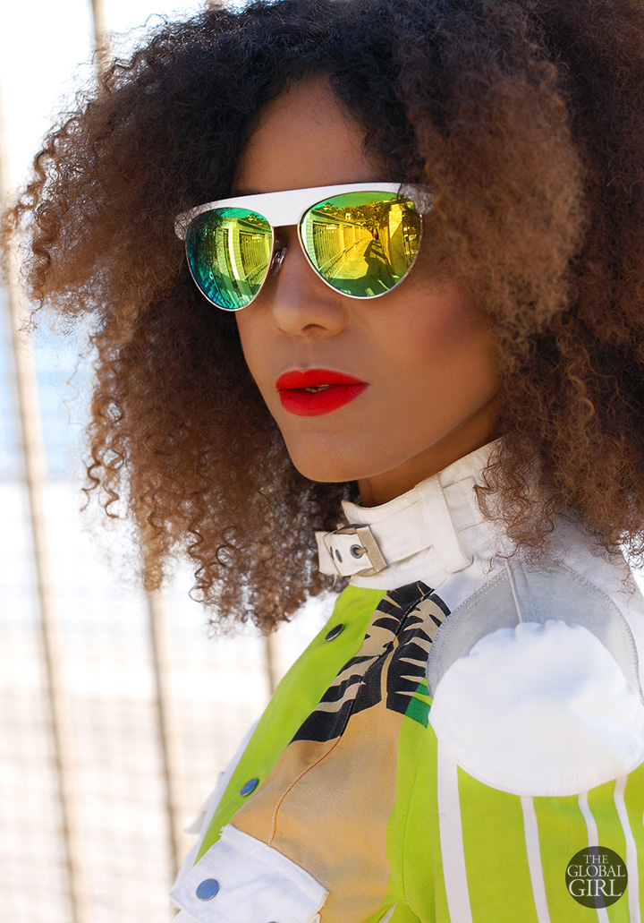 The Global Girl Daily Style: Ndoema rocks a bold yellow and green mirrored white sunglasses.
