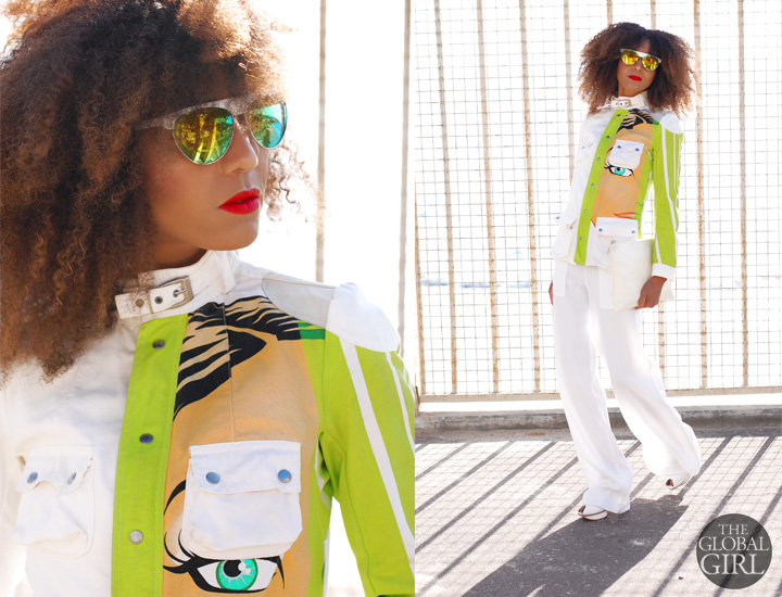 The Global Girl Daily Style: Ndoema rocks a printed jacket by Custo Barcelona with yellow and green mirrored white sunglasses, white python clutch bag by Son Jung Wan and Cynthia Vincent white wide leg pants.